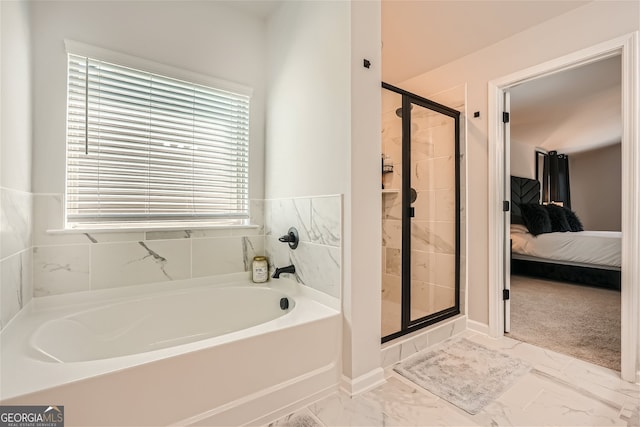 bathroom featuring a healthy amount of sunlight, tile floors, and plus walk in shower