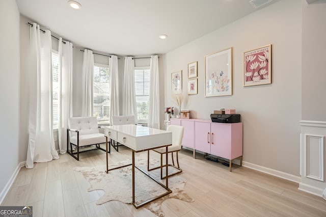 office space featuring recessed lighting, light wood-type flooring, and baseboards