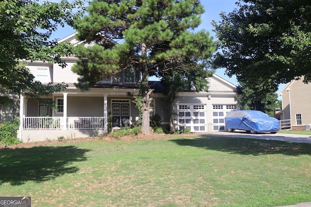 view of front facade with a front lawn and covered porch