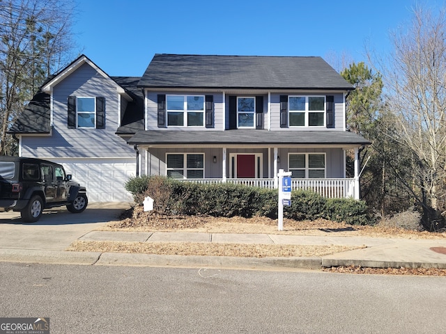 view of front of property with a garage