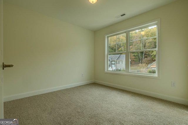 view of carpeted spare room