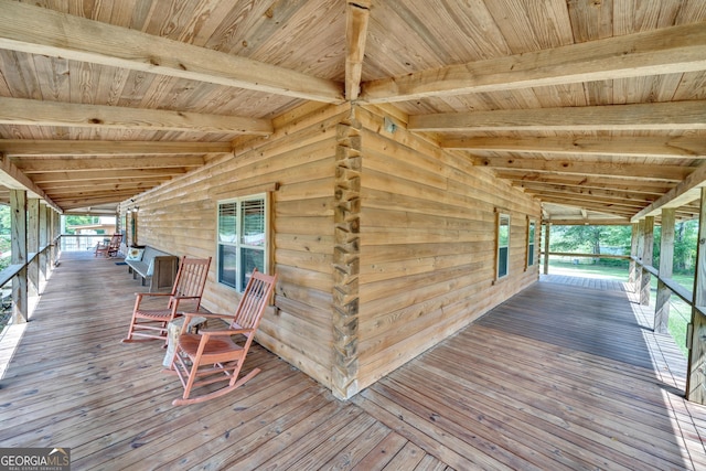 wooden terrace featuring a porch