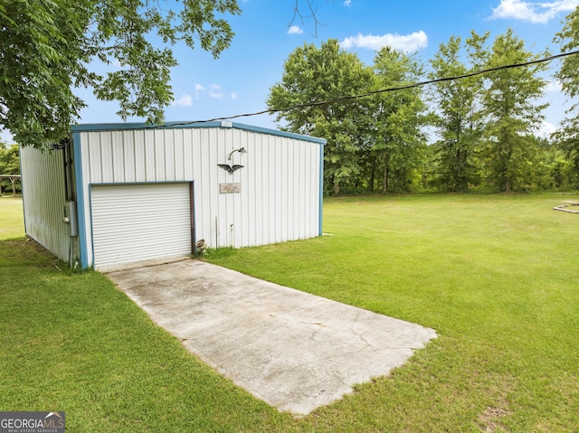 garage with a lawn