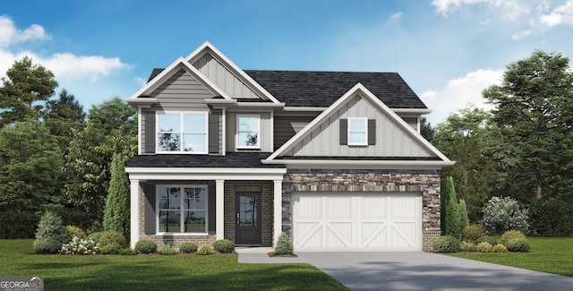 craftsman inspired home featuring a garage and a front yard