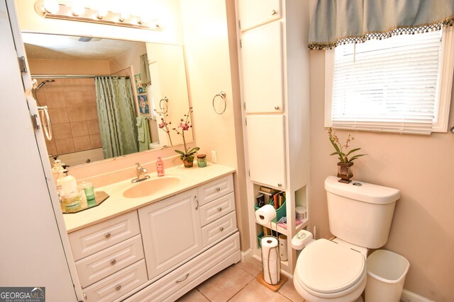 full bathroom with a shower with curtain, toilet, tile patterned flooring, baseboards, and vanity