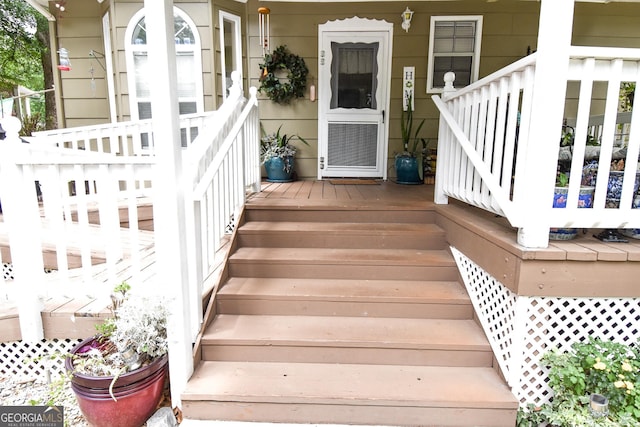 doorway to property with a porch