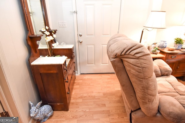 sitting room with light wood finished floors