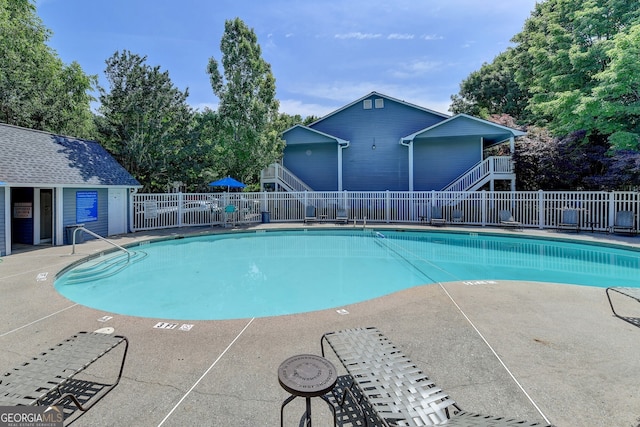 view of pool featuring a patio area