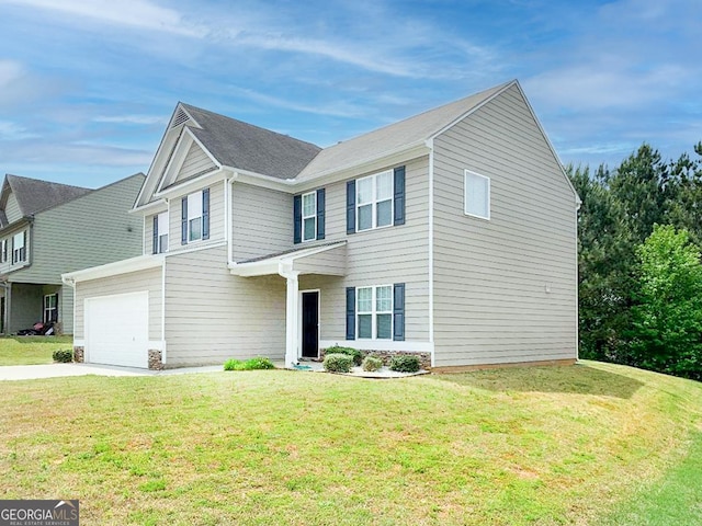 view of front of home with a garage and a front yard