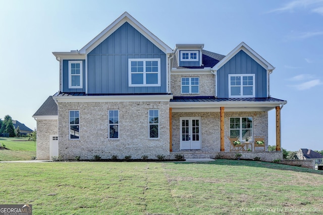 view of front of property with a front lawn