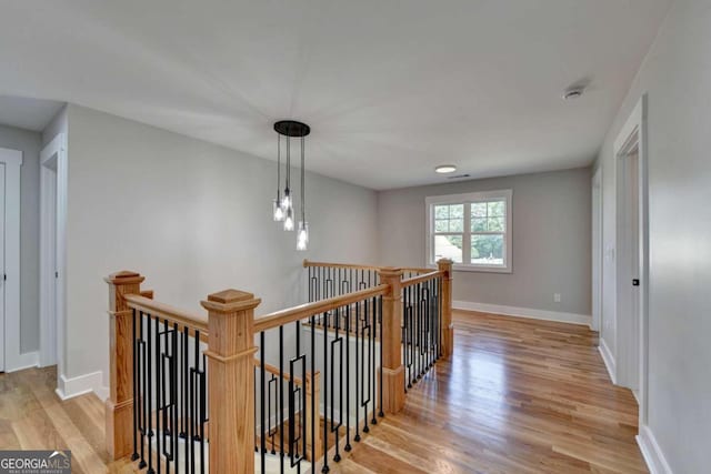 hallway with light wood-type flooring