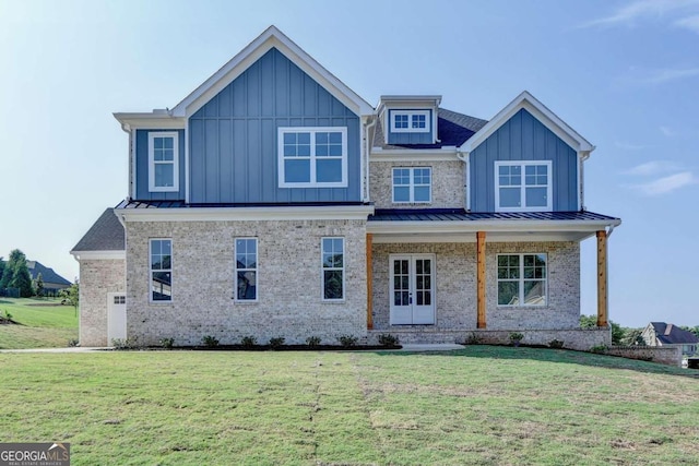 view of front of home with a front lawn