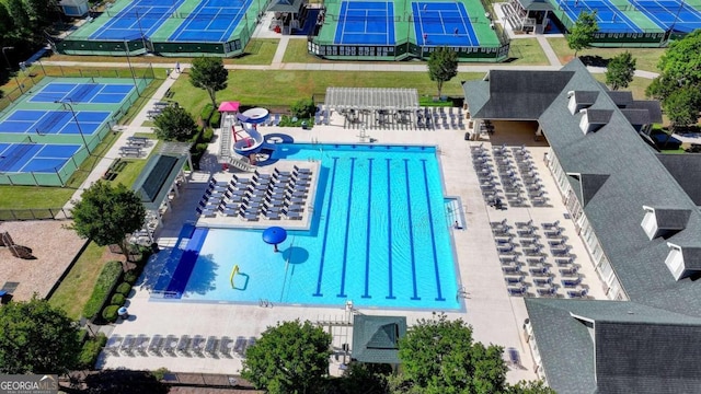 view of swimming pool with a patio area