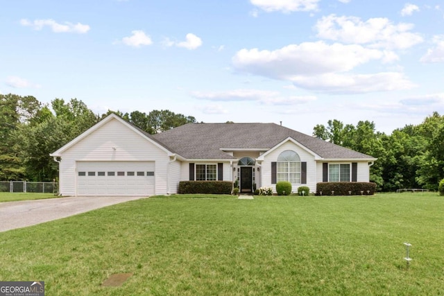 ranch-style house with a front yard and a garage