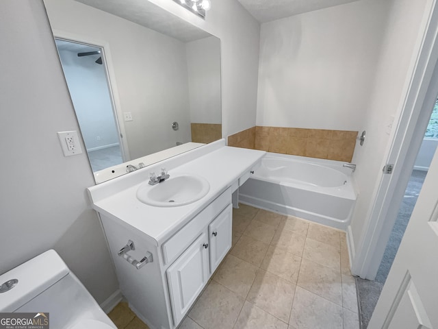 6531 Arbor Gate Dr SW # 12, Mableton, GA 30126 - bathroom with tile patterned flooring, vanity, toilet, and a tub
