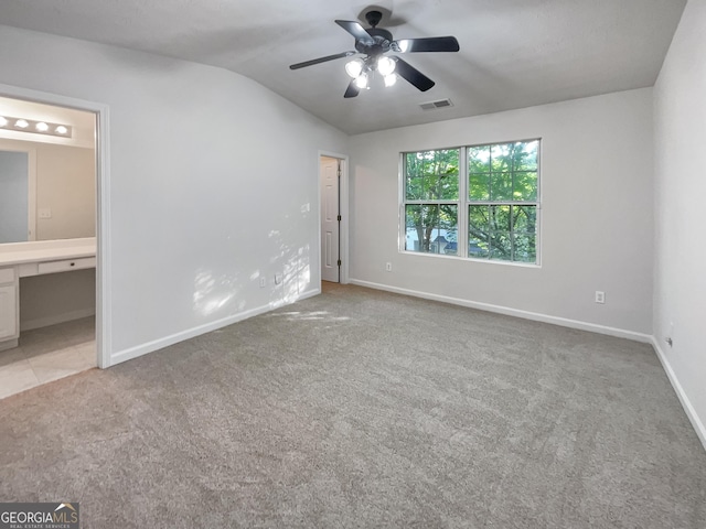 6531 Arbor Gate Dr SW # 12, Mableton, GA 30126 - unfurnished bedroom featuring ceiling fan, light colored carpet, lofted ceiling, and connected bathroom