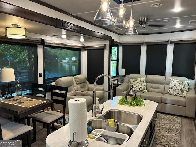 interior space with sink and dark hardwood / wood-style floors