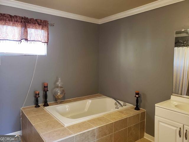 bathroom featuring vanity, ornamental molding, and tiled tub