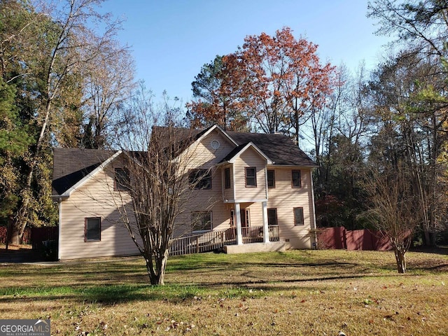 view of property with a front lawn