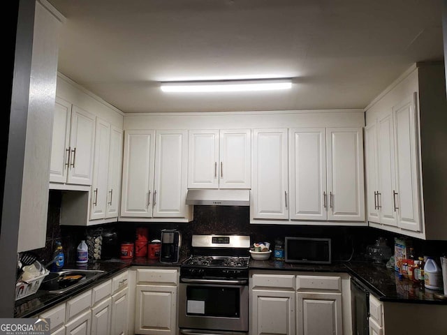 kitchen with white cabinets, sink, appliances with stainless steel finishes, and tasteful backsplash