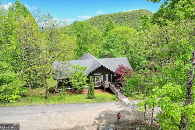 view of front of house featuring a mountain view