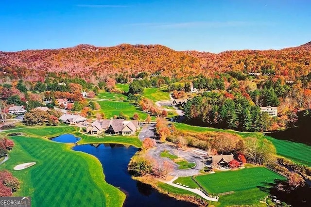 aerial view with a water and mountain view