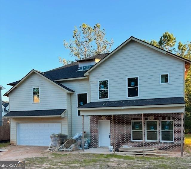 view of property featuring a garage