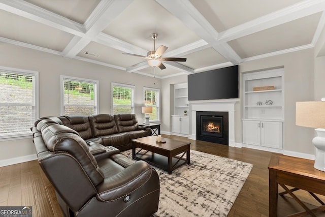 living room with beamed ceiling, dark hardwood / wood-style floors, and coffered ceiling