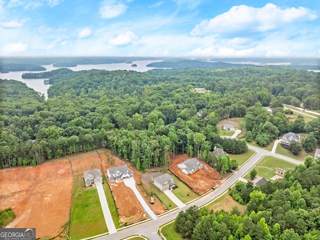 drone / aerial view with a water view