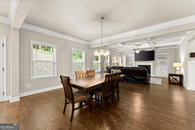 dining space featuring ceiling fan with notable chandelier, dark hardwood / wood-style floors, crown molding, and coffered ceiling