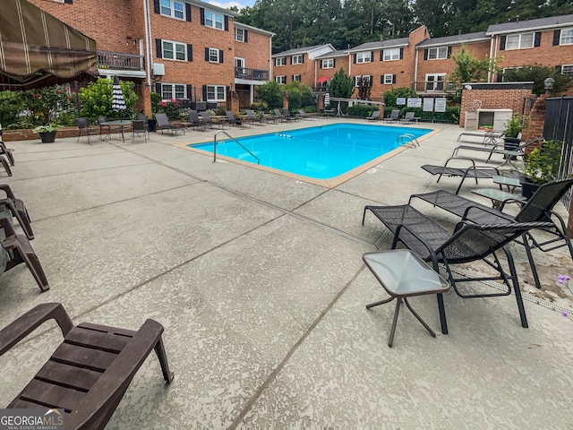 view of pool with a patio