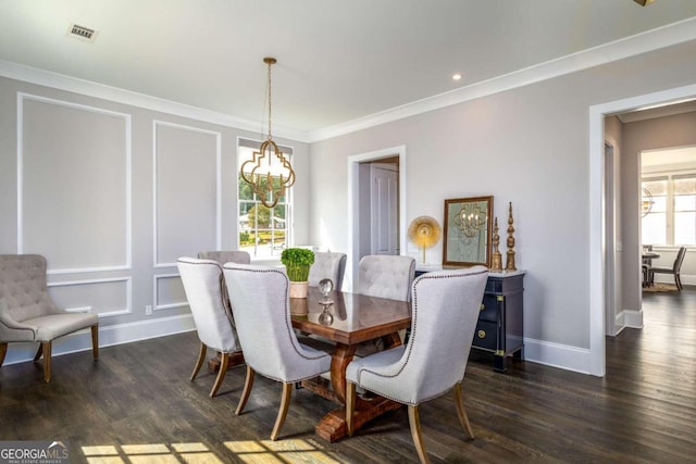 dining room with crown molding, a healthy amount of sunlight, a notable chandelier, and dark hardwood / wood-style floors