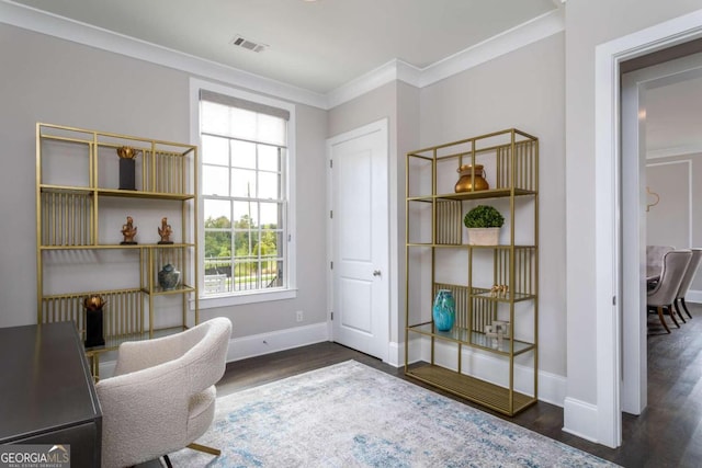 home office featuring ornamental molding and dark hardwood / wood-style floors