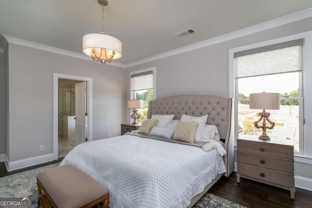 bedroom with ornamental molding, ensuite bathroom, dark hardwood / wood-style floors, and multiple windows