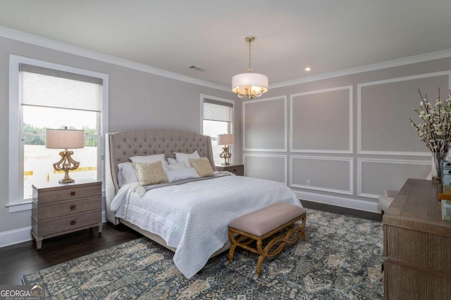 bedroom featuring a notable chandelier, ornamental molding, and dark hardwood / wood-style floors