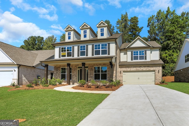 view of front facade featuring a front yard and covered porch