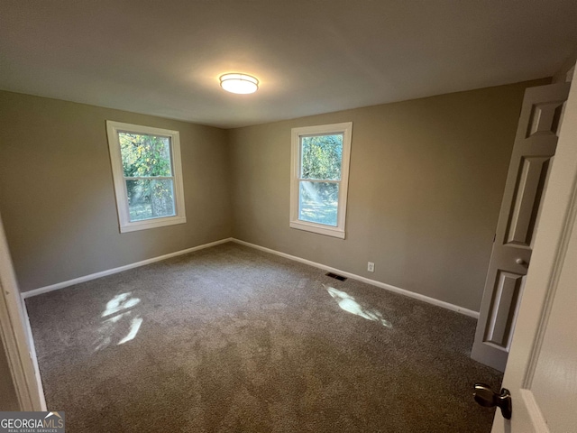 view of carpeted spare room