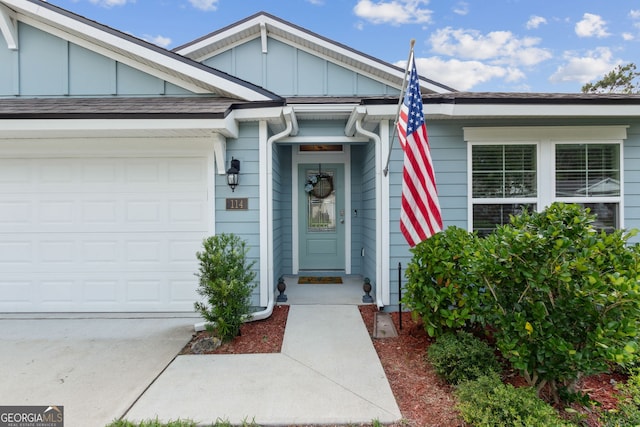 property entrance featuring a garage