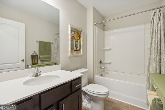 full bathroom featuring toilet, vanity, shower / bathtub combination with curtain, and hardwood / wood-style floors