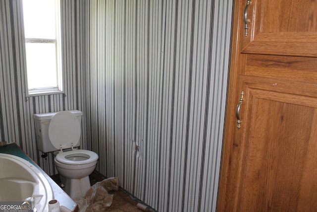 bathroom featuring toilet