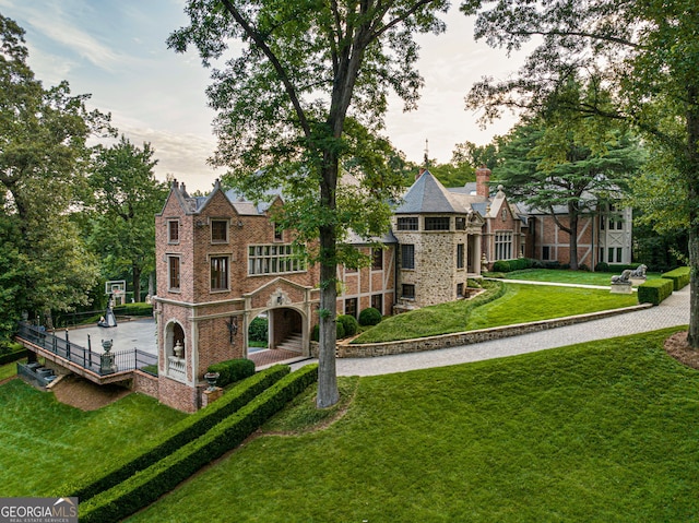 exterior space with a front lawn