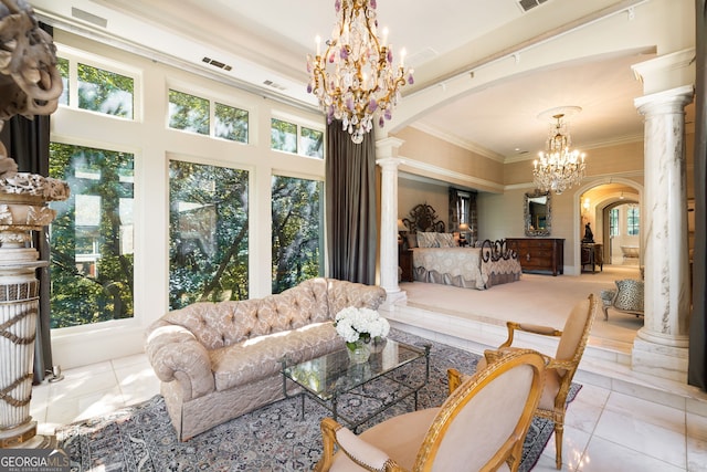 tiled living room with a notable chandelier, ornamental molding, and decorative columns