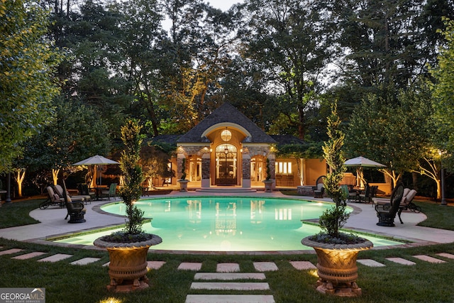 view of swimming pool with a patio area