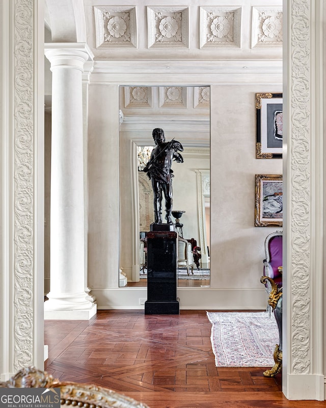 details with crown molding and ornate columns