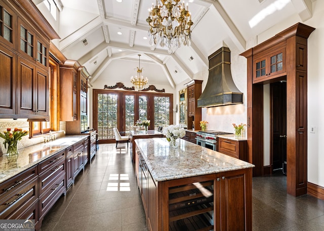 kitchen featuring beverage cooler, double oven range, custom range hood, a kitchen island, and high vaulted ceiling