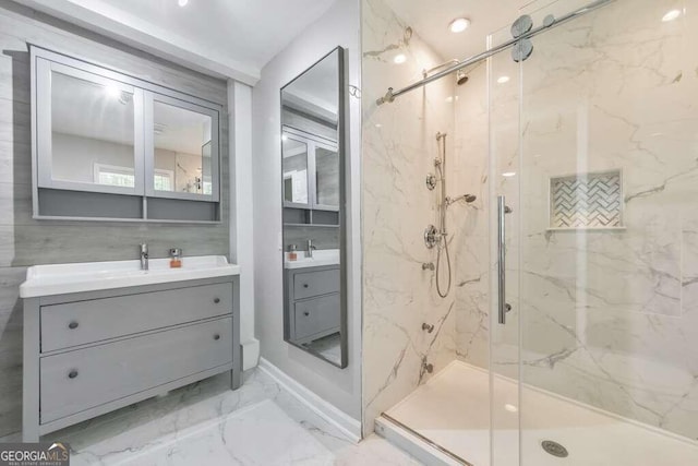 bathroom with tile walls, vanity, walk in shower, and tile patterned floors