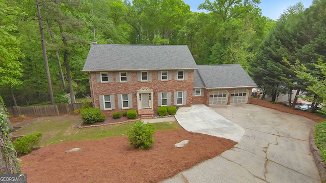 colonial inspired home with a garage