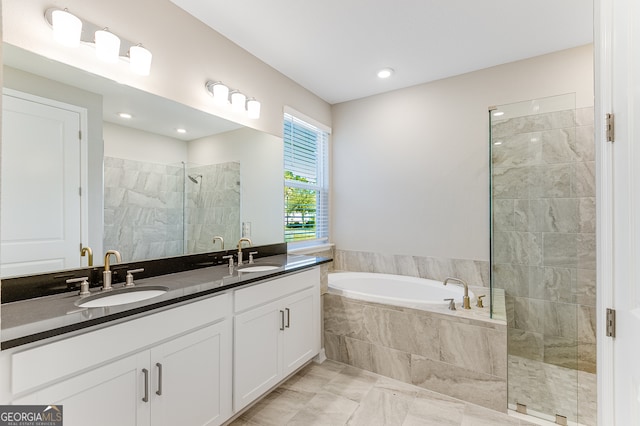 bathroom with vanity and plus walk in shower