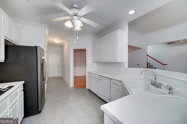 kitchen featuring light wood-type flooring, white cabinets, dishwasher, sink, and crown molding