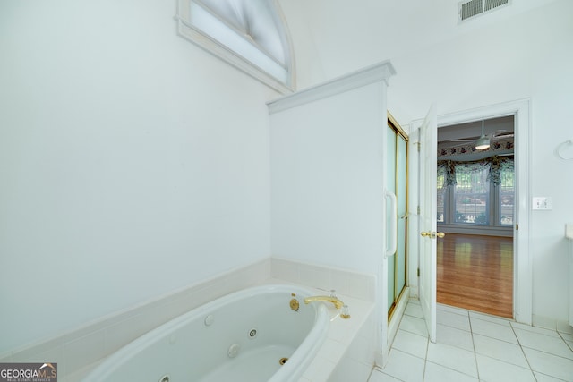 bathroom with hardwood / wood-style floors and a shower with door